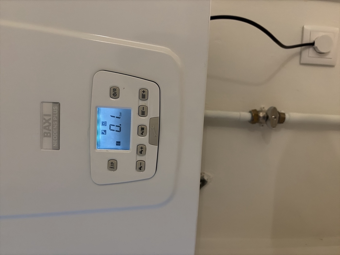 Combi boiler display showing 0.1 bar pressure and an error symbol